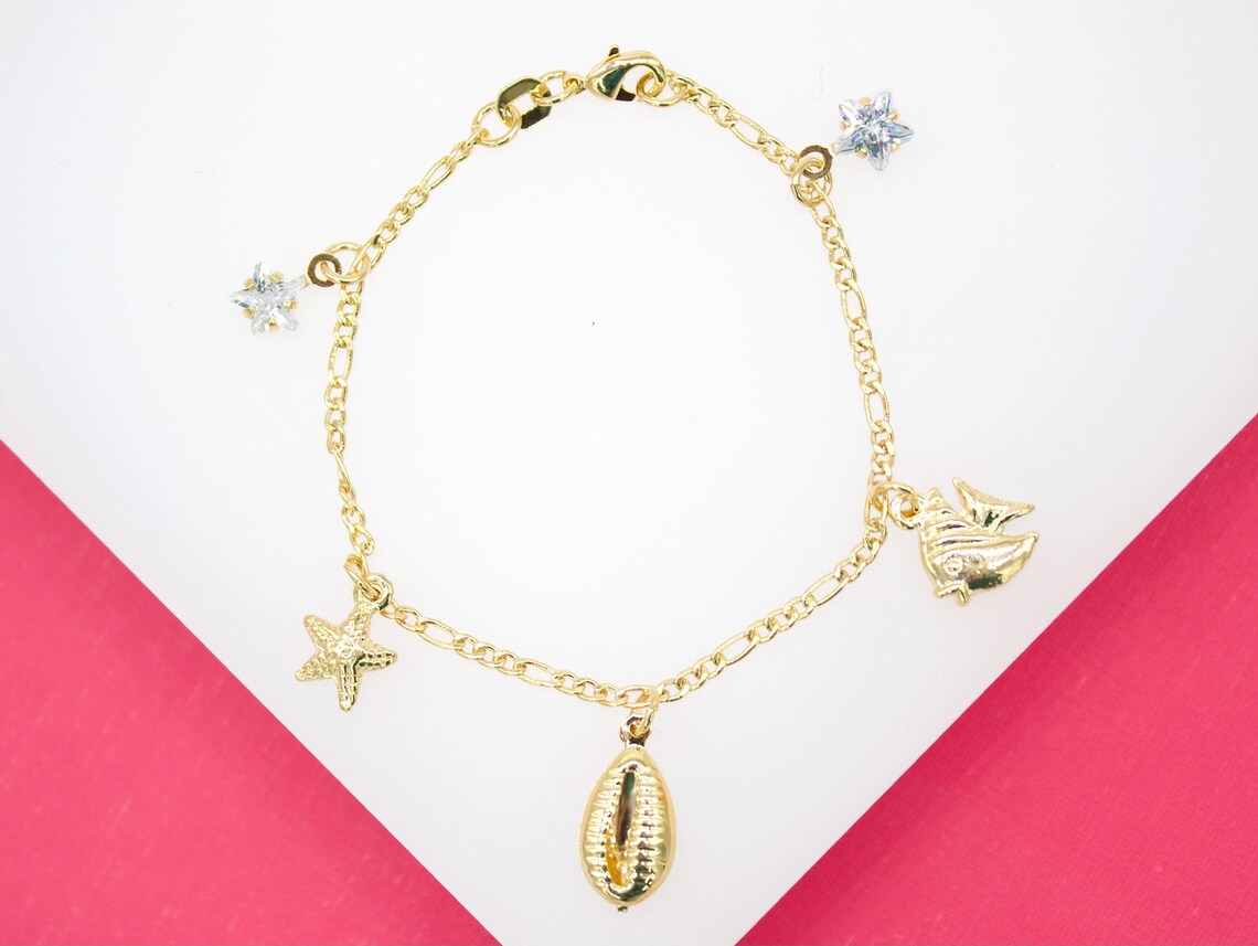 18K Gold Filled Dangle Star Cz Puka Shell Fish Charm Bracelet
